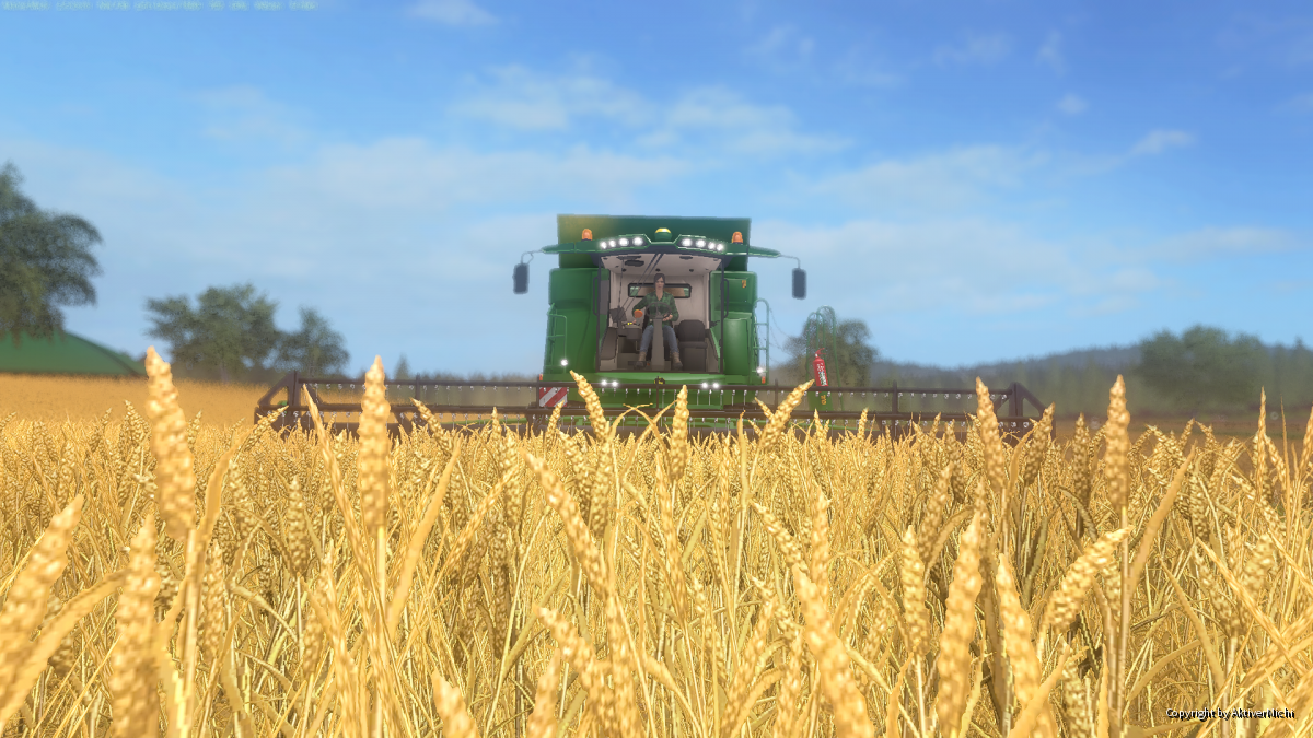 Weizen Ernte mit dem John Deer T650i